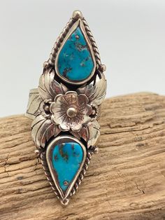 This beautiful turquoise ring was handcrafted in Nepal set with Tibetan silver in  floral design.This ring is adjustable.The measurement of this ring is approxmately  52mm in length and it weighs about 7gm. American Jewelry, Native American Jewelry, Himalayan, Tibet, Rings Statement, Nepal, Turquoise Ring, Favorite Jewelry, Jewelry Pieces