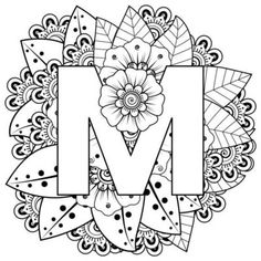 the letter m is surrounded by flowers and leaves