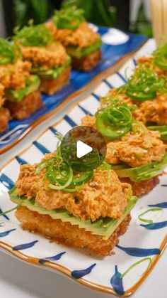 two plates with food on them sitting on a table