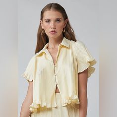 Maddie Polo Shirt In Vanilla Rue Stiic Chic Collared Summer Tops, Elegant Yellow Summer Shirt, Elegant Cropped Summer Shirt, Elegant Cropped Shirt For Summer, Elegant Collared Yellow Tops, Elegant Yellow Collared Tops, Chic Short Sleeve Shirt For Spring, Elegant Yellow Tops For Daywear, Chic Yellow Cropped Blouse