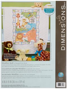 the sewing pattern for this baby's quilting kit includes teddy bears and giraffes