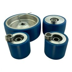 three blue rollers with one bearing and the other bearing