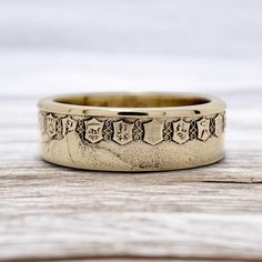 Experience the timeless elegance and rich cultural legacy of Italy with our exclusive Coin Ring Italy. Handcrafted from authentic Italian coins, each ring is a unique piece of jewelry that captures the essence of this iconic Mediterranean nation. These rings are more than just accessories; they are a tribute to Italy's profound history, artistic achievements, and passion for beauty and craftsmanship. Our skilled artisans carefully preserve the intricate details of each coin, showcasing symbols that resonate with Italian identity--such as the laurel wreaths of ancient Rome, representing victory and honor, or the iconic imagery of the Italian Republic. Wearing the Coin Ring Italy connects you to the heart of Italian culture, evoking the grandeur of Rome's ancient ruins, the beauty of the Tus Brass Round Band Jewelry Gift, Heirloom Brass Rings For Anniversary, Heirloom Engraved Round Band Rings, Victorian Rings With Engraving Option For Anniversary, Symbolic Engraved Rings For Ceremonial Occasion, Symbolic Ceremonial Engraved Rings, Victorian Sterling Silver Rings In Gold, Victorian Gold Rings In Sterling Silver, Victorian Gold Sterling Silver Rings