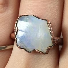 Raw opal ring Australian opal ring Rough opal ring Raw | Etsy Unique Opal Ring With Moonstone, Spiritual Opal Promise Ring, Unique Opal Gemstone Rings, Opal Crystal Open Ring With Gemstone, White Opal Open Ring, Opal Gemstone Ring As A Gift, Opal Moonstone Open Ring For Gift, Handmade Opal Promise Ring, Unique Iridescent Opal Jewelry