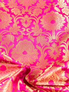 Category: Silk Brocade Khinkhwab brings you beautiful fabrics and yardage from Banaras. You can turn these beautiful banarasi brocade fabrics into a traditional blouse, Indian kurta or a western jacket. For Blouse you need 1 meter of fabric, for kurta you need 3 meters, for jackets you need 2 meters of fabric. Pair these beautiful fabrics with your Banarasi sarees and dupattas and add more glamour to it. Fabric: Semi Silk Brocade Price mentioned is for one meter. Note- There may be slight color variations due to photographic reasons. This is a hand-woven product and any irregularities in the weaving or pattern should not be taken as a defect. These irregularities make every handloom piece unique. Brocade Blouse Piece With Zari Work For Puja, Bollywood Brocade Blouse Piece For Puja, Brocade Fabric With Zari Weaving For Festivals, Brocade Blouse Piece For Puja With Self Design, Anarkali Brocade Blouse With Motifs, Brocade Embroidered Fabric With Self Design For Festivals, Pink Brocade Blouse Piece With Pallu, Brocade Blouse Piece For Puja And Navratri, Diwali Brocade Blouse Piece With Pallu