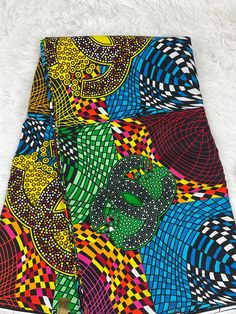 This green and gold African Fabric is high quality African print made from 100% cotton and it's 45 inches wide. It is used for making African Clothing, African quilts, & For Home decoration. FYI: Print is Double sided. The listing is for 1, 6 yards and Headwrap Each piece of fabric measures:  36in by 45in for 1 yard 216in by 45in for 6 yards 70in by 22in for Head wrap If you purchase more than one yard, you will receive one continuous piece. *If you require more than what I have listed, feel free to send me email. CARE INSTRUCTIONS: *DO NOT BLEACH *Hand wash with cold water and mild soap or Dry clean *Press with hot iron for a crispy look. Color may be different due to your monitor Traditional Multicolor Ankara Fabric, Multicolor Batik Print Fabric For Festivals, Yellow Fabric With Traditional Patterns For Festivals, Traditional Yellow Fabric With Colorful Pattern, Green Traditional Fabric With Colorful Pattern, Traditional Green Fabric With Colorful Pattern, Traditional Ankara Fabric In Multicolor, Colorful Green Ankara Fabric, Yellow Ankara Fabric With Traditional Patterns