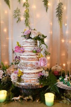 a wedding cake sitting on top of a table