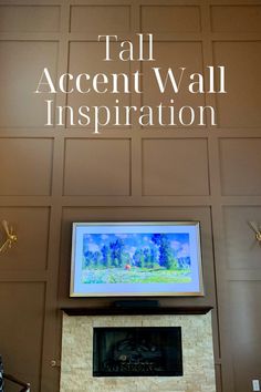 a fireplace with the words tall accent wall inspiration above it and an image of a landscape