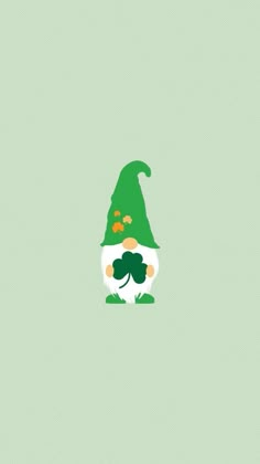 a green and white gnome with a shamrock hat