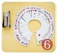 playing cards are laid out on the table to be used as an activity for children