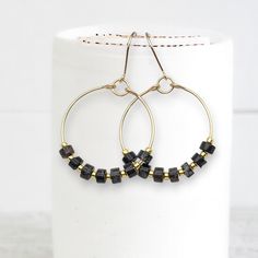 Boho Hoops - Gold & Black Earrings Bijou by SAM Modern Black Small Hoop Jewelry, Handmade Black Jewelry For Everyday, Black Handmade Jewelry For Everyday, Handmade Black Everyday Jewelry, Adjustable Hoop Jewelry With Gold Beads, Adjustable Gold Bead Hoop Jewelry, Minimalist Beaded Onyx Jewelry, Everyday Onyx Jewelry With Black Beads, Minimalist Onyx Beaded Jewelry