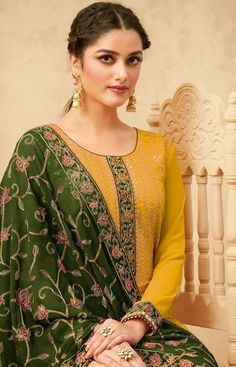 COLOR : Daffodil Yellow & Army Green FABRIC : Top - Pure Georgette, Bottom & Inner - Dull Santoon, Dupatta - Pure Georgette WORK : Heavy Resham Embroidery, Zari Work, Sequins, Stones, Motifs, Lace Border OCCASION : Wedding, Reception, Engagement, Party Wear, Festival READY-TO-WEAR : NoSTITCHING : Available as semi-stitched fabric, can be stitched using standard size option (+$20). Note: There might be a slight color variation due to lighting and flash used during photoshoot. The bright shade see Yellow Green Combination Dress, Daffodil Yellow, Wholesale Clothing Suppliers, Wholesale Catalog, Salwar Kamiz, Embroidered Pants, Maria B, Designer Salwar Suits, Salwar Kameez Designs