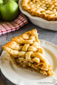 a slice of apple pie on a white plate