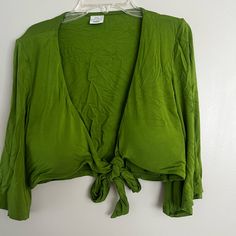 Padded Crop Top With 3/4 Bell Sleeves. Never Worn. Green Long Sleeve Summer Top, Casual Green Wrap Blouse, Casual Green Wrap Top, Trendy Spring Wrap Crop Top, Trendy Wrap Crop Top For Spring, Green V-neck Crop Top For Spring, Green V-neck Crop Top For Day Out, Casual Wrap Crop Top For Day Out, Green Long Sleeve Crop Top For Day Out