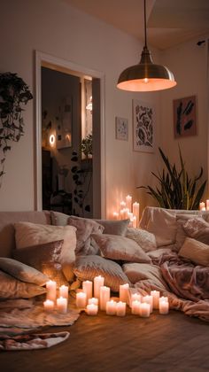 a living room filled with lots of candles