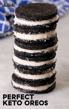 a stack of black and white cookies sitting on top of each other with the words perfect keto oreos