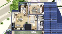 an aerial view of a house from above with the floor plan and furniture labeled in blue