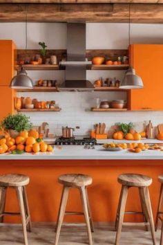 an orange kitchen with three stools in front of the island