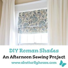 a window with roman shades and the words diy roman shades an afternoon sewing project