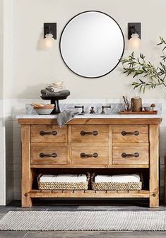 a bathroom with a wooden cabinet and mirror