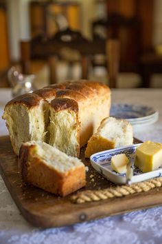 bread and butter on a wooden cutting board