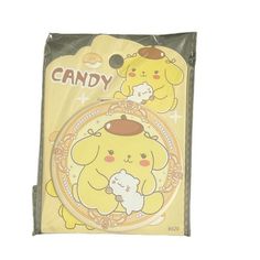 a package of candy with an image of two bears and a cat on the front