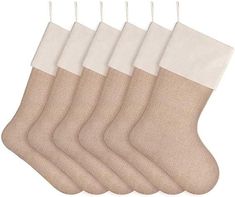 five pairs of socks with white and beige stockings hanging from the side, on a white background