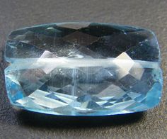 a large blue diamond sitting on top of a table