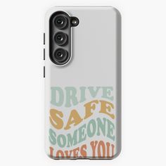 a white phone case with the words drive safe someone loves you in orange and green