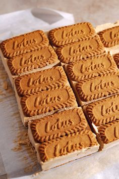 there are many cookies on the table ready to be cut into squares and put together