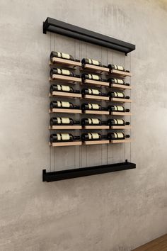 a wall mounted wine rack filled with lots of bottles