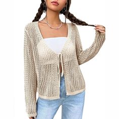 Elevate your summer style with the KOJOOIN Women's Lightweight Crochet Cardigan, a perfect blend of elegance and comfort. This chic tie-front shrug knit cardigan is crafted from a soft and breathable mix of 89% Viscose and 11% Nylon, ensuring a comfortable fit that moves with you. Its delicate crochet detailing and mesh design add a sophisticated touch to any outfit, making it an ideal choice for beach cover-ups or adding a layer of warmth on cooler evenings.

- **Material:** 89% Viscose, 11% Ny Beige V-neck Sweater For Vacation, V-neck Open Knit Cardigan For Day Out, Beach V-neck Knit Cardigan, Non-stretch Bohemian V-neck Cardigan, Non-stretch V-neck Bohemian Cardigan, Beach V-neck Knitted Cardigan, Knit Open Front Top For Summer, Open Front Knit Top For Summer, Casual Fall Sweater For Vacation