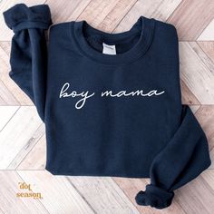 A Comfortable boy Mama crewneck sweatshirt featuring a boy mama on a cozy sweatshirt perfect for everyday & occasions and gifts for any event or celebration. SIZING Please refer to the sizing chart in the pictures for sizing reference. This is a UNISEX sweatshirt. PRODUCT DETAILS  Gildan Crewneck UNISEX Sweatshirt 50% cotton, 50% polyester Pre-shrunk Air jet yarn for softer feel and reduced pilling Double-needle stitched collar, shoulders, armholes, cuffs, and hem CARE INSTRUCTIONS Machine wash Grammy Sweatshirt, Boy Mom Sweatshirt, Nana Sweatshirt, Grandma Sweatshirt, Mom Of Boys, Mom Of Boys Shirt, Dog Mama Shirt, Mama Sweater, Boy Mama