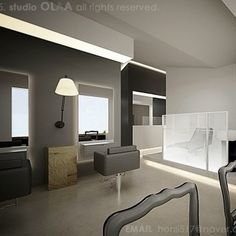 the interior of a modern living room with black and white furniture