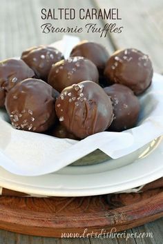 chocolate covered donuts on a white plate