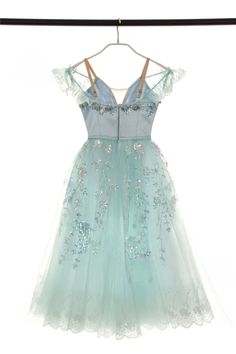 Romantic pale blue tutu, created for the role of the Winter Fairy in the ballet "Cinderella". V-shaped pale blue satin bodice fastening in the back with a double row of hooks and eyes. Pale blue lace cap sleeves attached to the nude straps. The bodice is richly decorated with pale blue small flowers and silver sparkles. The Romantic pale blue tulle skirt is entirely embellished with silver sparkles and appliques, making this tutu extremely shiny! Custom made. Delivery time: 6 to 8 weeks $ 560 Fitted Balletcore Fairy Dress, Fitted Blue Fairy Dress, Spring Balletcore Dance Dresses, Elegant Tulle Dress For Dance, Balletcore Tulle Dress For Dance, Ballet Cinderella, Blue Tulle Skirt, Blue Tutu, Winter Fairy