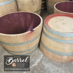 several wooden barrels stacked on top of each other