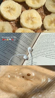 there are bananas on top of bread and in the background is an open book with earbuds