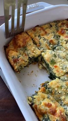 a casserole dish with broccoli and cheese on it, ready to be eaten