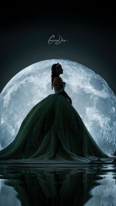 a woman in a green dress sitting on top of a body of water next to a full moon