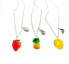 "This listing is for one fruit necklace. Your choice of Strawberry, Orange, or Pineapple! These necklaces are great for those summer beach vibes all year round. The main center charm is silver plated photo realistic and about the size of a quarter (give or tank) and the secondary charm varies but is smaller than the main, colorful charm. To see an example of how these lay look at the last potato quality photo! I keep the main fruit free sliding but I lock the smaller fruit charm for a layered bu Salad Pineapple, Smudge Wands, Happy Potato, Ambrosia Fruit Salad, Summer Beach Vibes, Black Sage, Fruit Necklace, Pineapple Strawberry, Orange Citrus