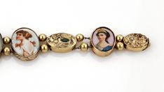 "This is a gorgeous antique bracelet, from the 1930s, it is crafted from solid 14k yellow gold featuring 8 oval shape links in assorted size, three with embossed floral design and is adorned with sapphire, emerald and diamond, five of the oval frame links are with handpainted porcelain cameo of 16th Century women in various dress style. Each oval link is separated by two gold balls on a double chain which fastens with a push in clasp with latch for added security. Metal: 14k yellow gold Hallmark Victorian Gold Bracelets With Cabochon, Antique Oval Cameo Bracelet, Victorian Gold Bracelet Collectible, Ornate Oval Gold Bracelets, Ornate Gold Oval Bracelets, Ornate Oval Gold Bracelet, Victorian Oval Engraved Bracelets, Antique Oval Gold Bracelet, Vintage Oval Gold Bracelet As Gift