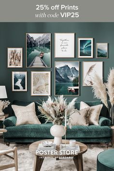 a living room filled with green couches and pictures on the wall above them,