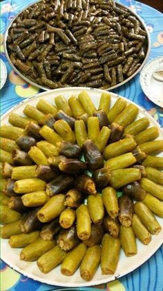 there are many different types of food on the table and one has an eggplant in it