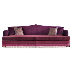 a purple couch with two pillows on it