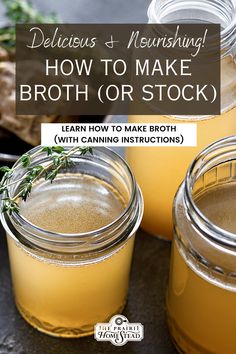 two jars filled with liquid sitting on top of a table