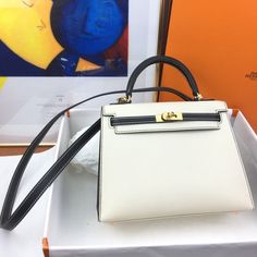 HM Kelly 25 Sellier Epsom White/Black Bag For Women Kelly 25 Sellier, Hermes Kelly 25, Kelly 25, Louis Vuitton Shirt, Hermes Kelly 28, Womens Handbags, Hermes Bags, Evening Clutch Bag, Black Bag