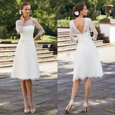 the back of a woman's wedding dress with long sleeves