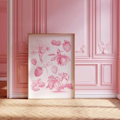 a pink room with strawberrys on the wall and other fruit in the frame,