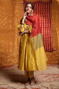 Mustard A-line kali kurta with tribal hand embroidered placket. Comes with pant and tri color dupatta. - Aza Fashions Embroidery Kurta, Easy Clothing, Indian Suit, Designer Anarkali Dresses, Designer Kurti Patterns, Kurti Patterns, Embroidery On Kurtis, Kurti Embroidery Design, Kurti Neck Designs